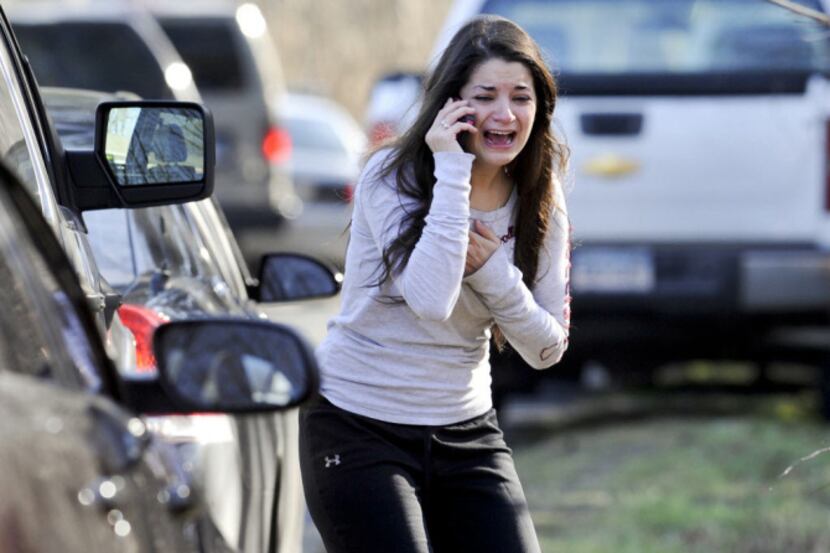 Carlee Soto reacts as she learns her sister, Victoria Soto, a teacher at the Sandy Hook...