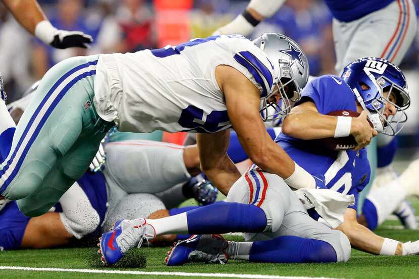 Dallas Cowboys defensive end Tyrone Crawford (98) sacks New York Giants quarterback Eli...