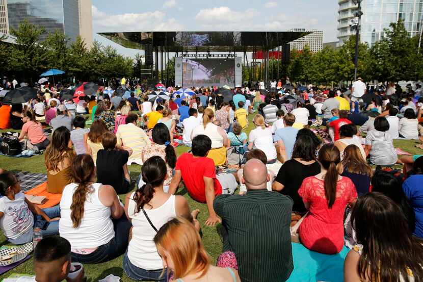 
People watch a live simulcast of Pope Francis’ closing Mass in Philadelphia at Klyde Warren...