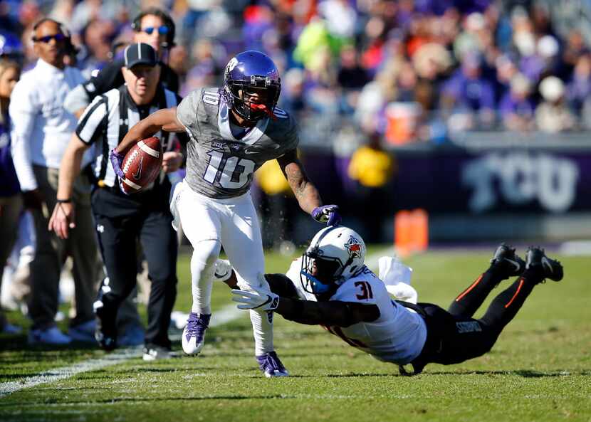 TCU Horned Frogs wide receiver Desmon White (10) shakes Oklahoma State Cowboys safety Tre...