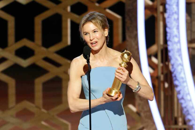 Renée Zellweger accepts the award for best actress in a motion picture drama for her role in...