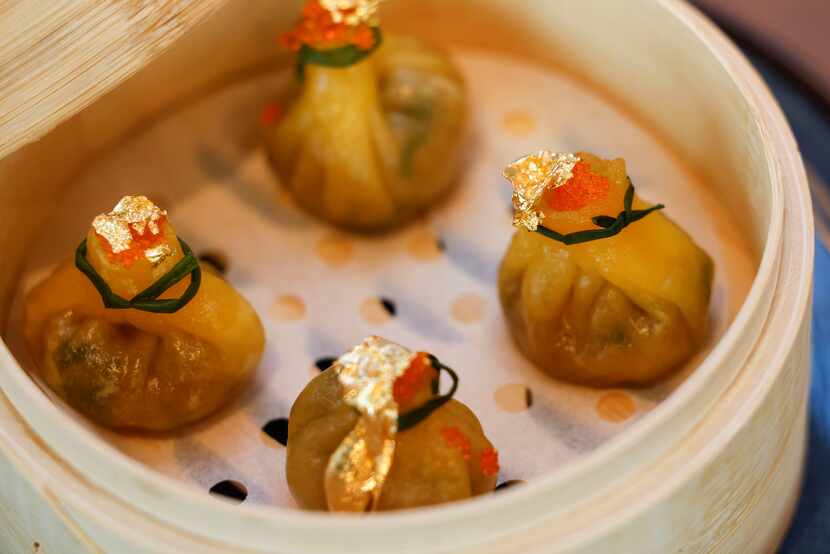 Komodo's New Year’s Eve three-course prix fixe menu will include moneybag dumplings. 