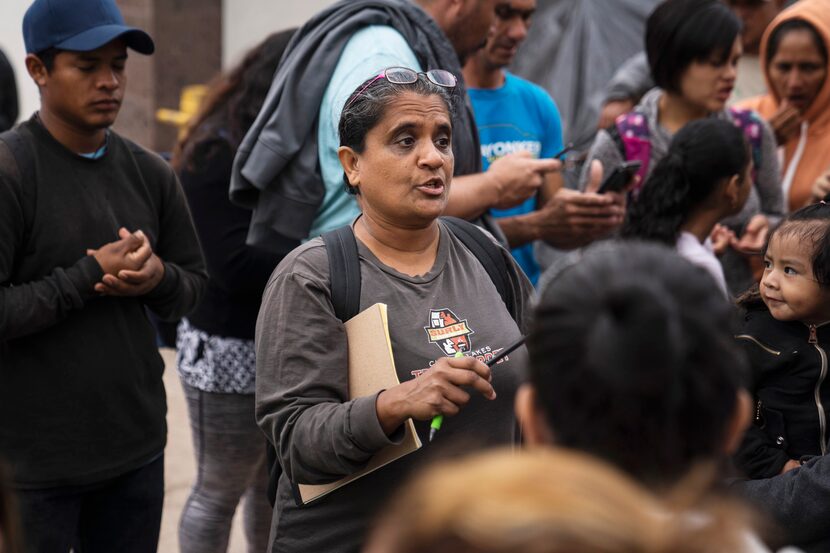 Immigration attorney Charlene D’Cruz teaches asylum seekers how to fill out asylum petitions...