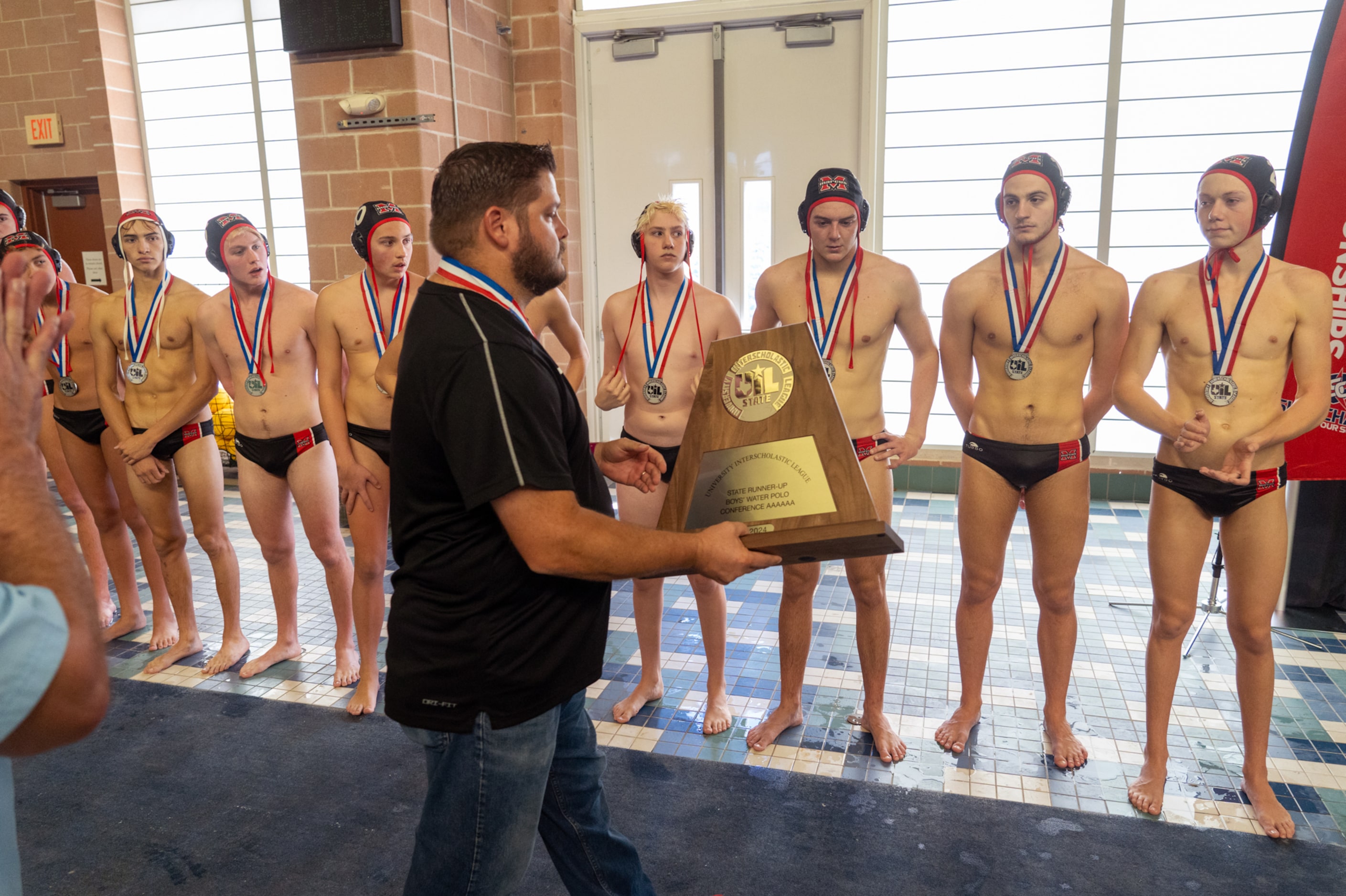 The Flower Mound Marcus Marauders receive their runner-up trophy after losing to the Clear...