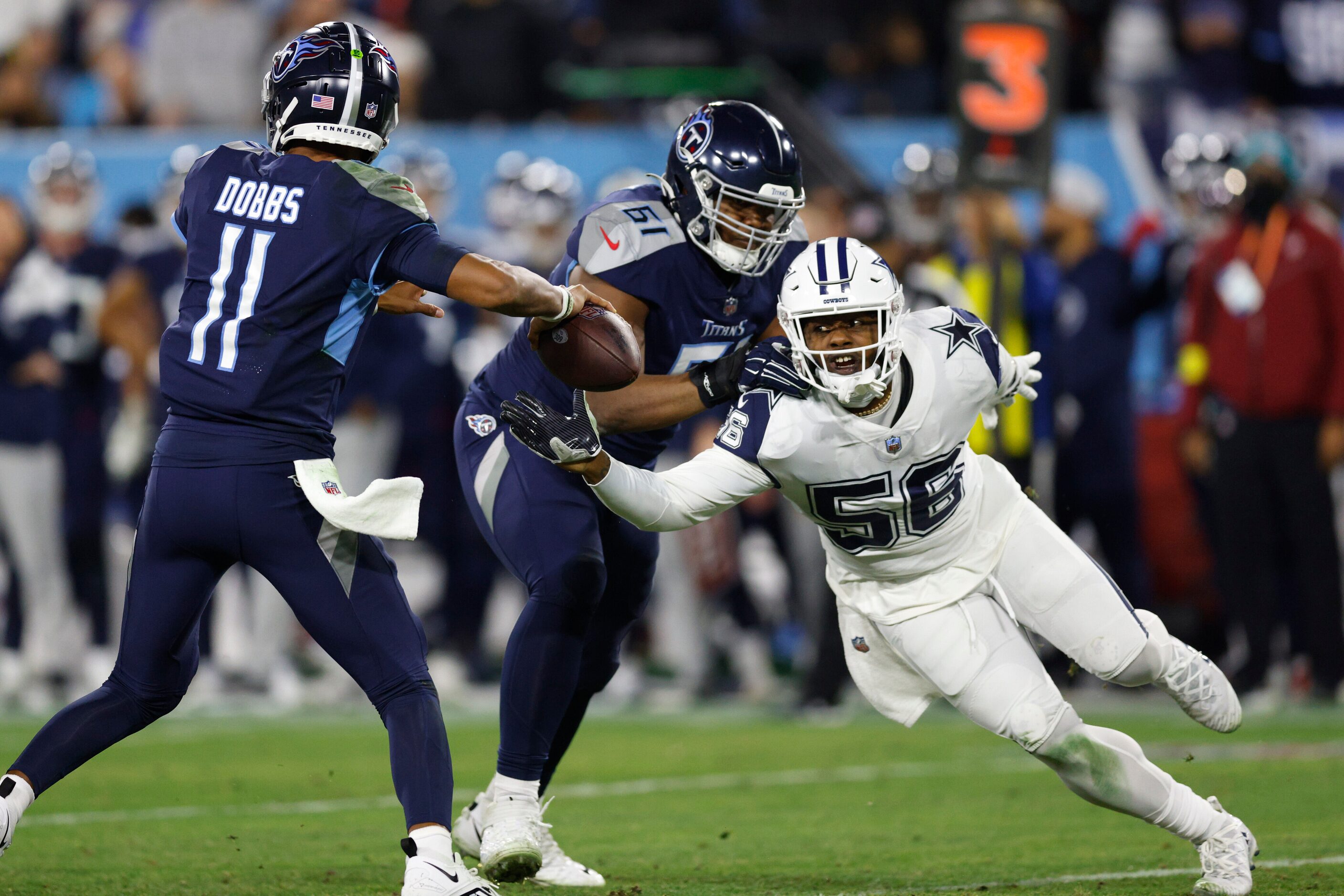 Dallas Cowboys defensive end Dante Fowler Jr. (56) pressures Tennessee Titans quarterback...