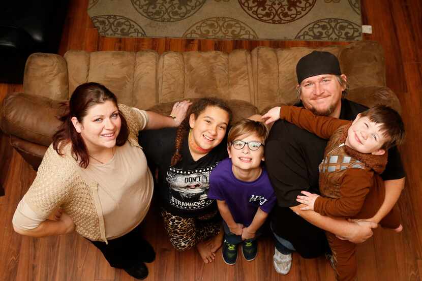 Tommie Ogletree (from left), Sydney Ogletree, 12, Bradley Ogletree, 10, Kelley Ogletree...