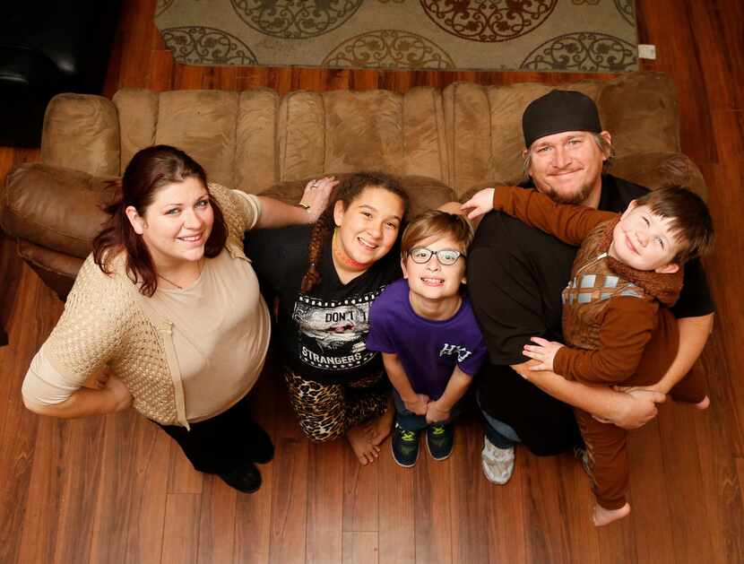 Tommie Ogletree (from left), Sydney Ogletree, 12, Bradley Ogletree, 10, Kelley Ogletree...