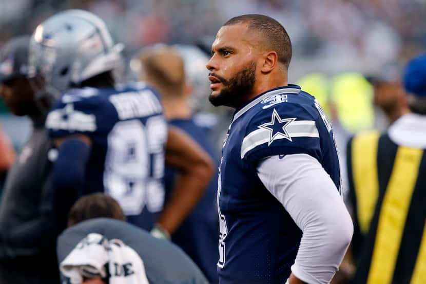 FILE — Dallas Cowboys quarterback Dak Prescott (4) is pictured on the sideline during the...