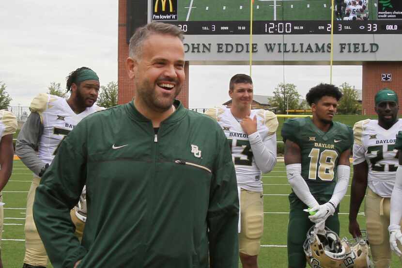 Baylor Head Football coach Matt Rhule smiles during halftime of the NCAA college football...