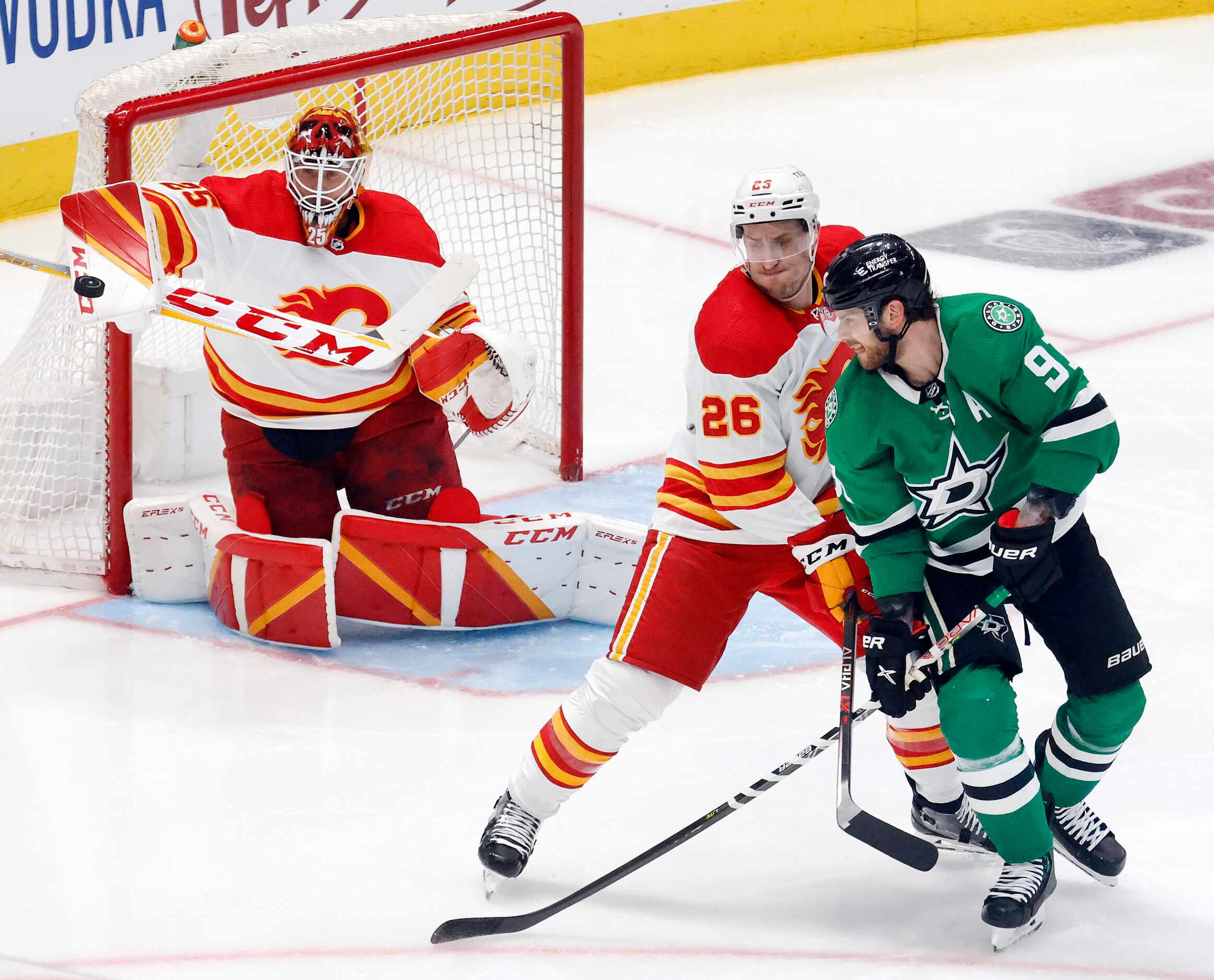 Dallas Stars center Tyler Seguin (91) looks back to see if a shot on Calgary Flames...