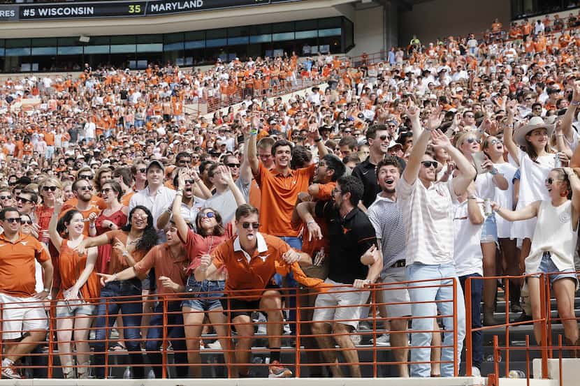 AUSTIN, TX - OCTOBER 21:  Texas Longhorns fans celebrate in the fourth quarter against the...