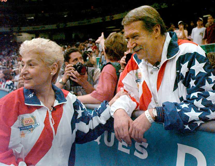 In this July 23, 2004, file photo, Martha and Bela Karolyi watch together as the U.S....