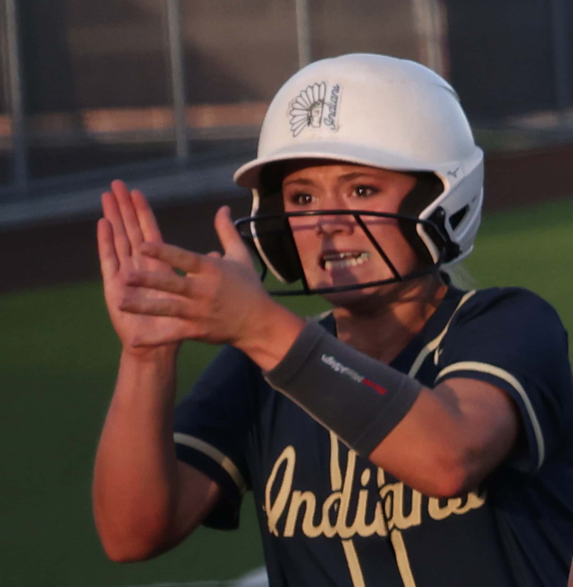 Keller's Landry Beaman (8) celebrates after scoring her team's first run in the top of the...