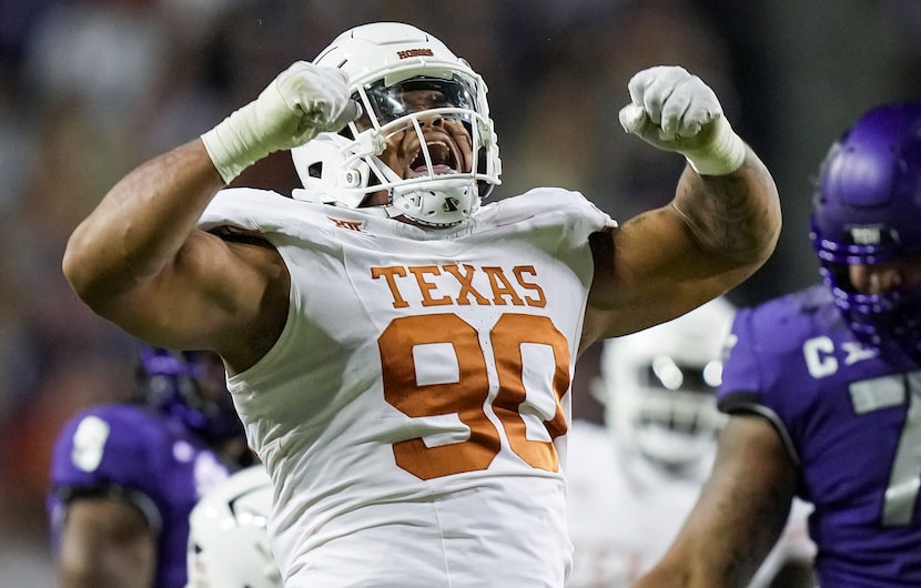 FILE - Texas defensive lineman Byron Murphy II (90) celebrates after a sack against TCU...