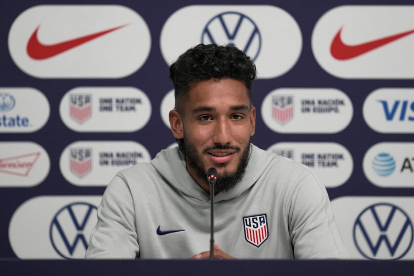 United States forward Jesus Ferreira speaks to reporters before an official training session...