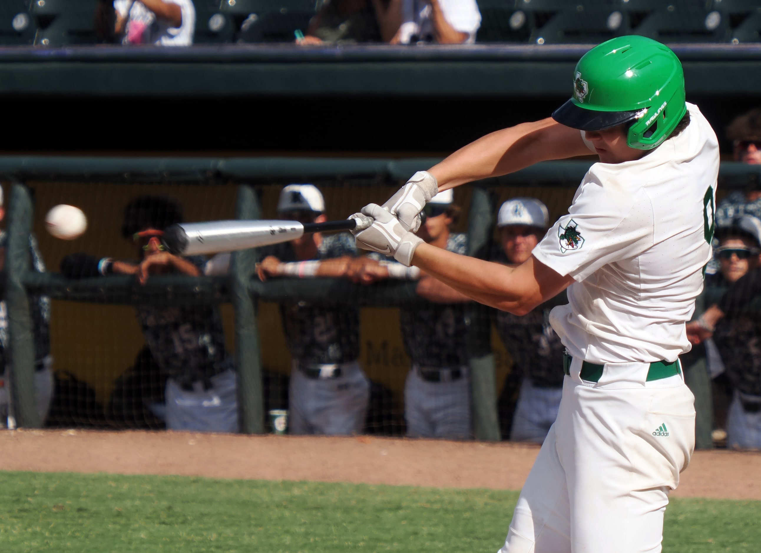 Southlake Carroll batter Owen Proksch (9) hits a 2-RBI single in the bottom of the 4th to...