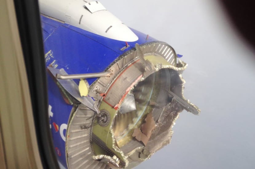 A photo from inside a Southwest Airlines plane during a flight in August shows damage to the...