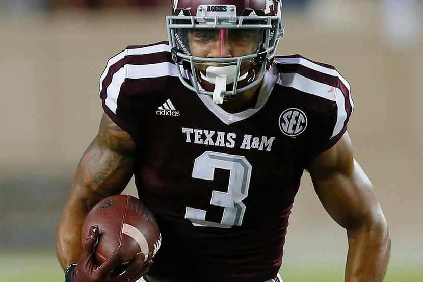 COLLEGE STATION, TX - SEPTEMBER 09:  Christian Kirk #3 of the Texas A&M Aggies breaks the...