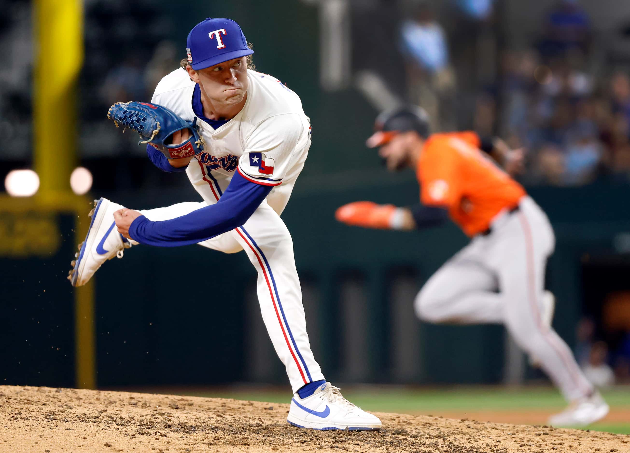 Texas Rangers pitcher Jacob Latz (67) follows through on a sixth inning pitch as Baltimore...