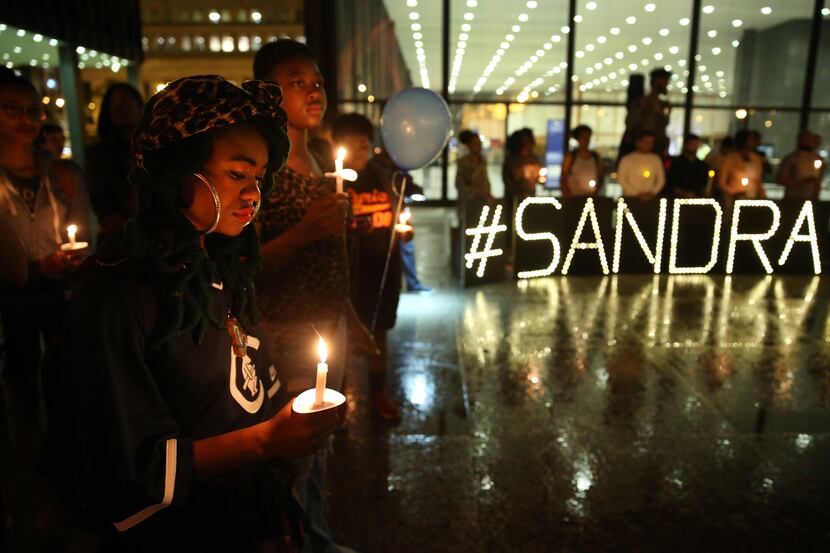 Kourtney Glenn attended a candlelight vigil for her sister, Sandra Bland, in Chicago on July...