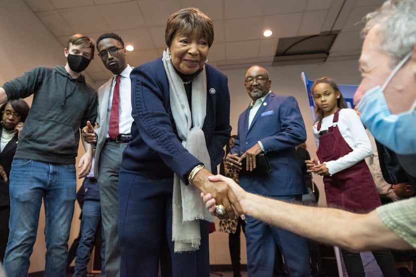 U.S. Rep. Eddie Bernice Johnson is congratulated by friends and colleagues after she...