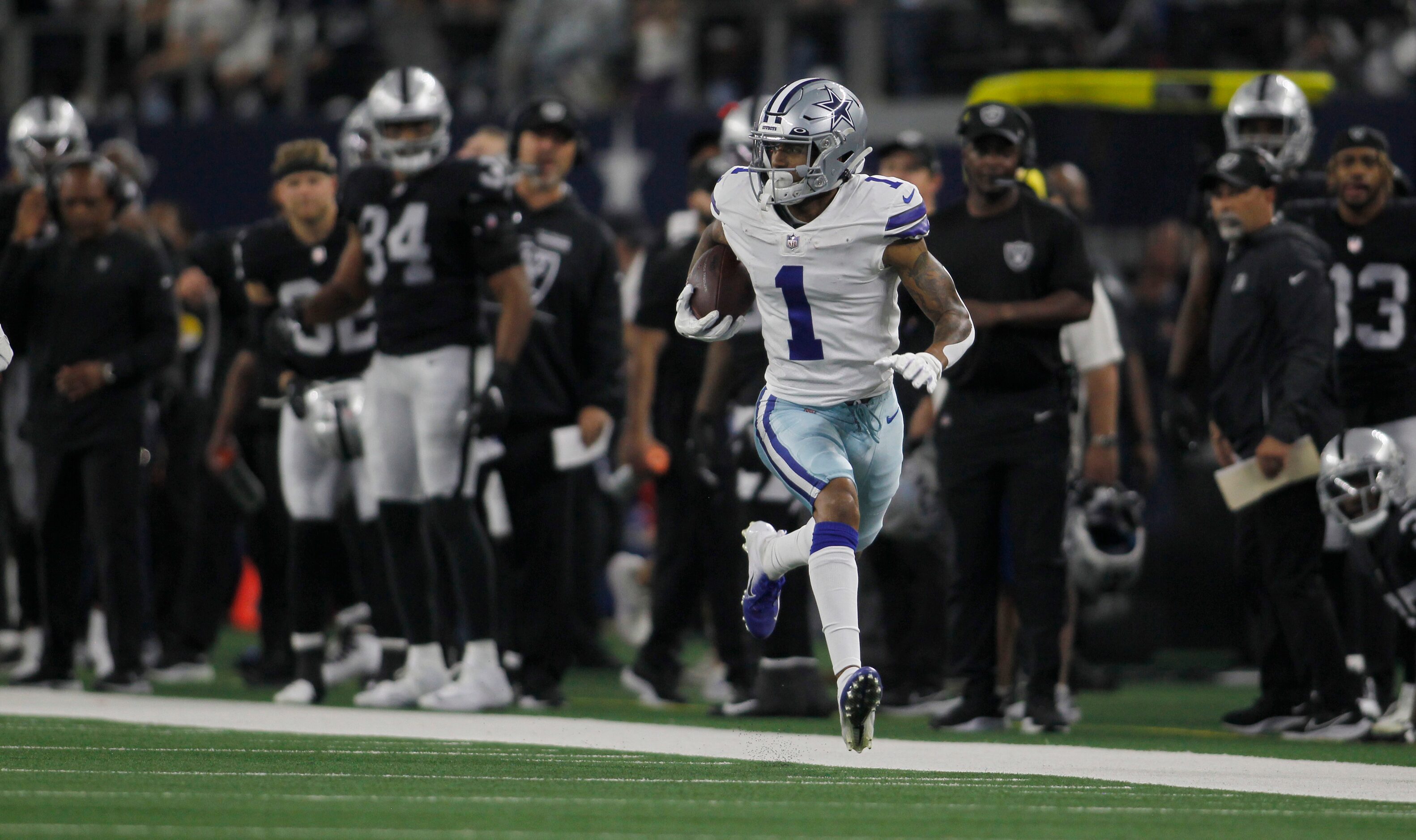 Dallas Cowboys wide receiver Cedrick Wilson (1) tacks on yardage following a 2nd quarter...