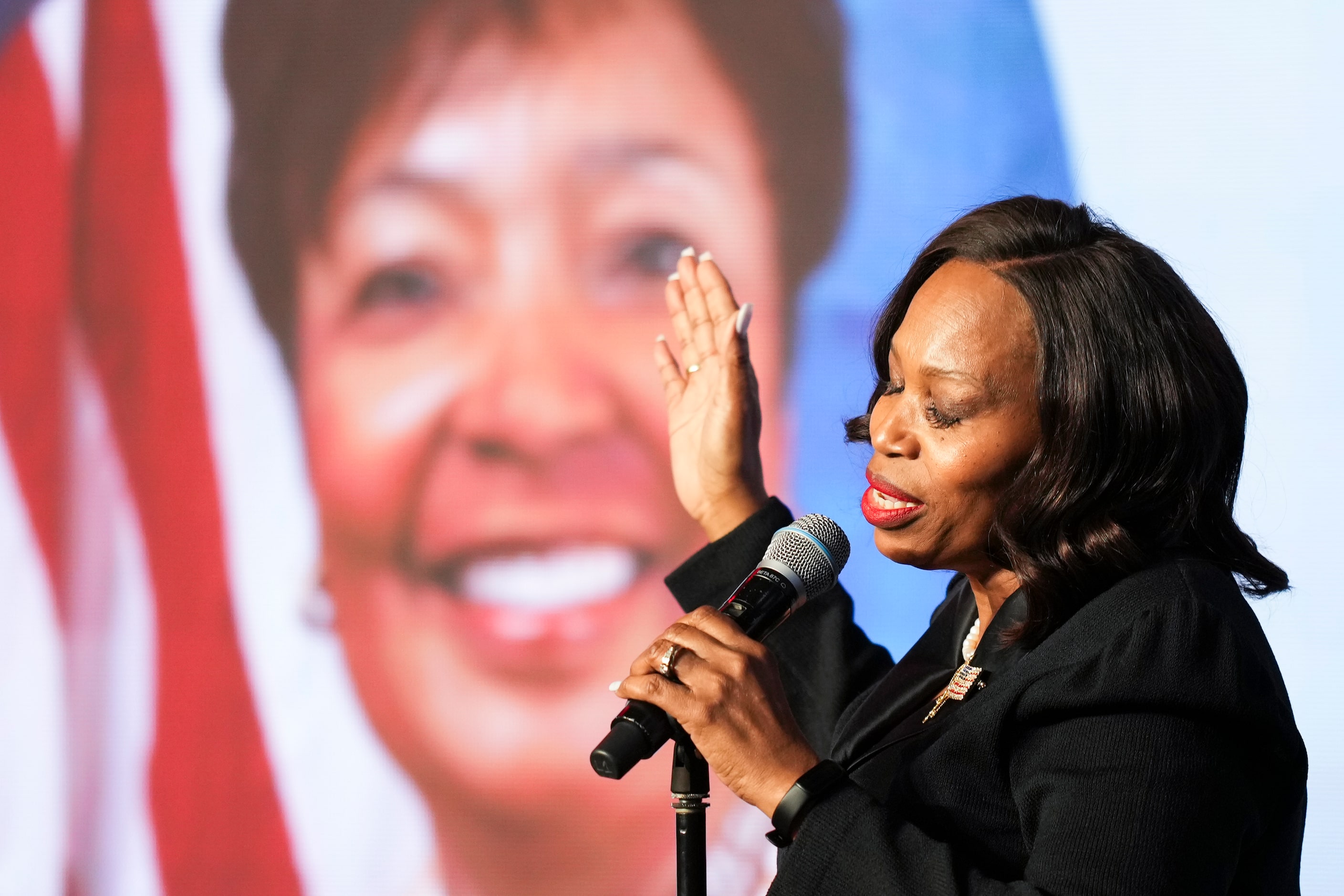 Sondra Johnson sings “We Shall Behold Him”during funeral services for her mother-in-law ...