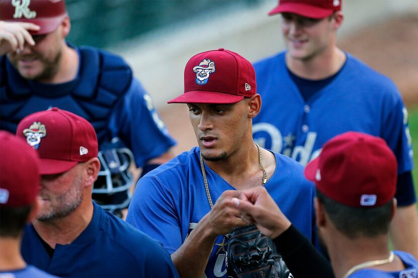 Frisco RoughRiders pitcher Jonathan Hernandez gets ready to take the mound as the...