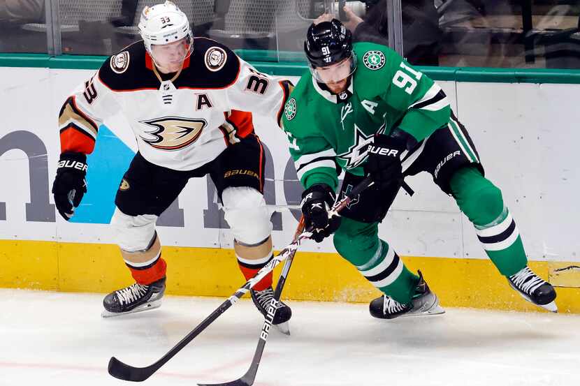 Dallas Stars center Tyler Seguin (91) battles Anaheim Ducks right wing Jakob Silfverberg...