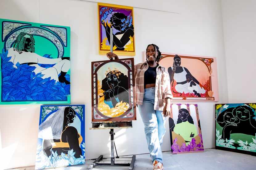 Dallas artist Desireé Vaniecia poses with her artwork that depicts Black figures in evolving...