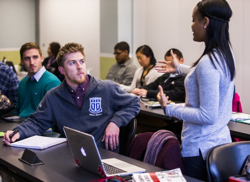 Duke University student Bryce McAteer (left) of Mission Viejo, Calif., listened to Paul...