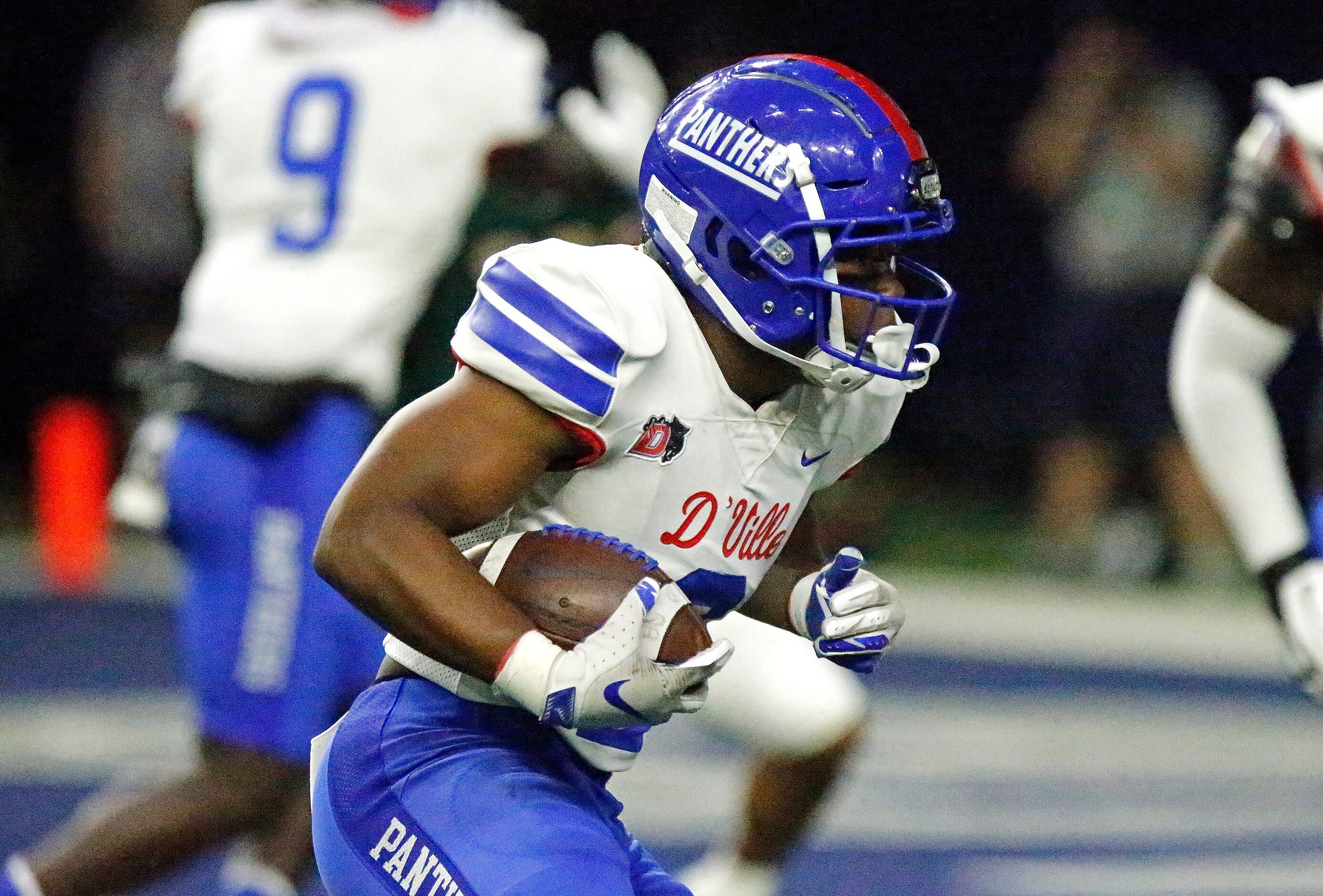 Duncanville High School running back Jordan Crook (2) carries the ball into the end zone for...