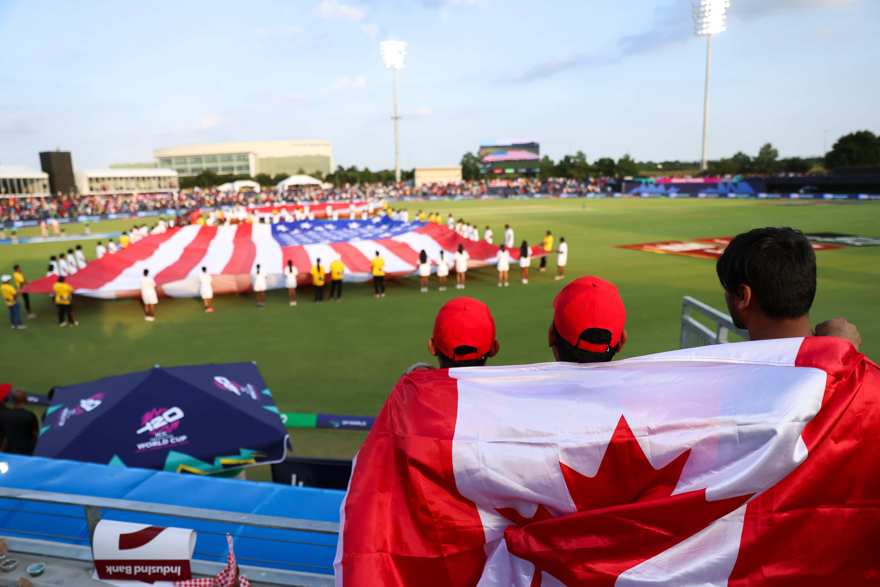 Fans stand during the national anthem of Canada during the opening ceremony of men's T20...