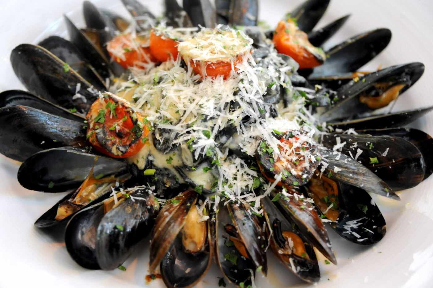 The linguini nero features PEI mussles, shallot, garlic, red chili flake, white wine sauce...