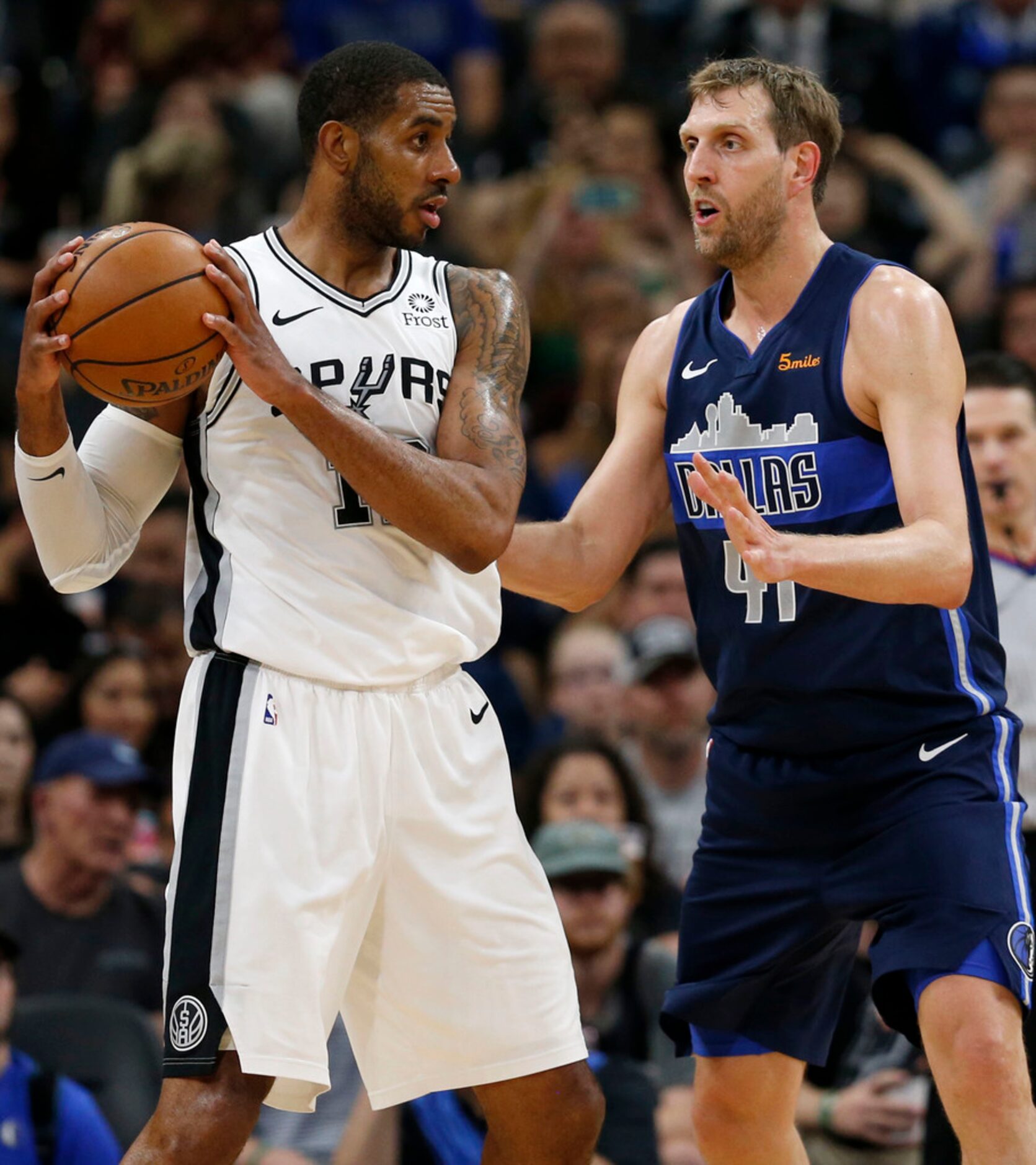 Dallas Mavericks forward Dirk Nowitzki (41) defends San Antonio Spurs center LaMarcus...