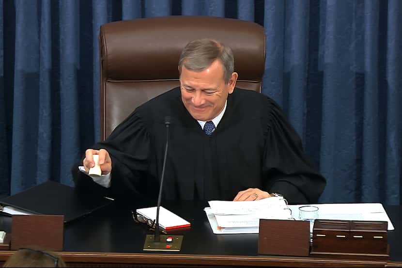 Supreme Court Chief Justice John Roberts gavels the impeachment trial against President...