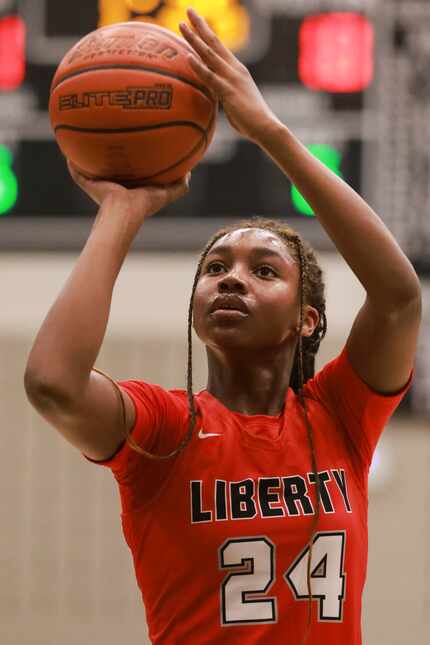 Frisco Liberty High School’s Jaci Abii (24) shoots a free throw during a game at Frisco...