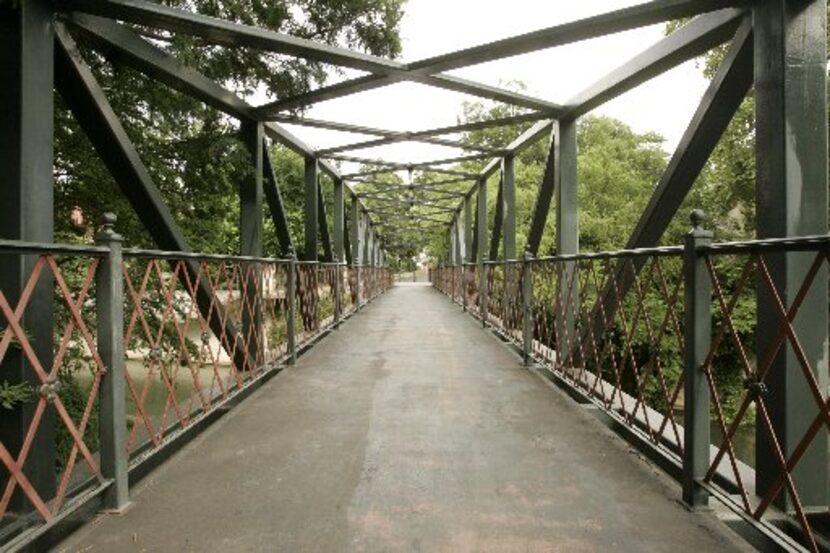 The Johnson Street Bridge leading to the King William Historical District along the south...