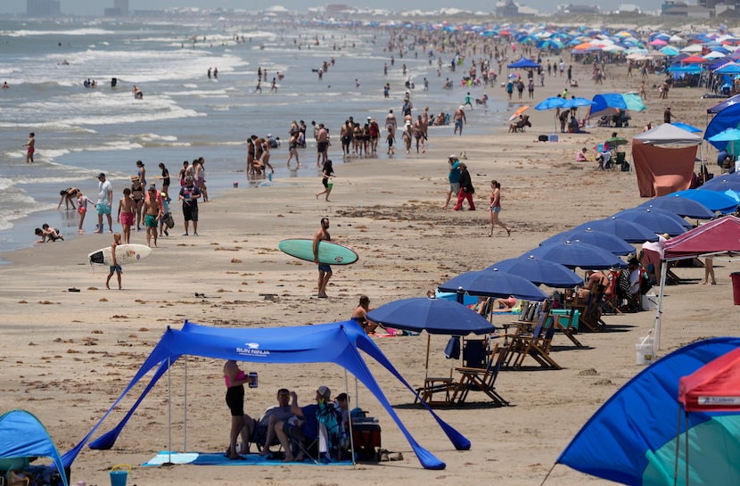 Visitors crowd the beaches in Port Aransas, Texas, ahead of Hurricane Beryl's arrival,...