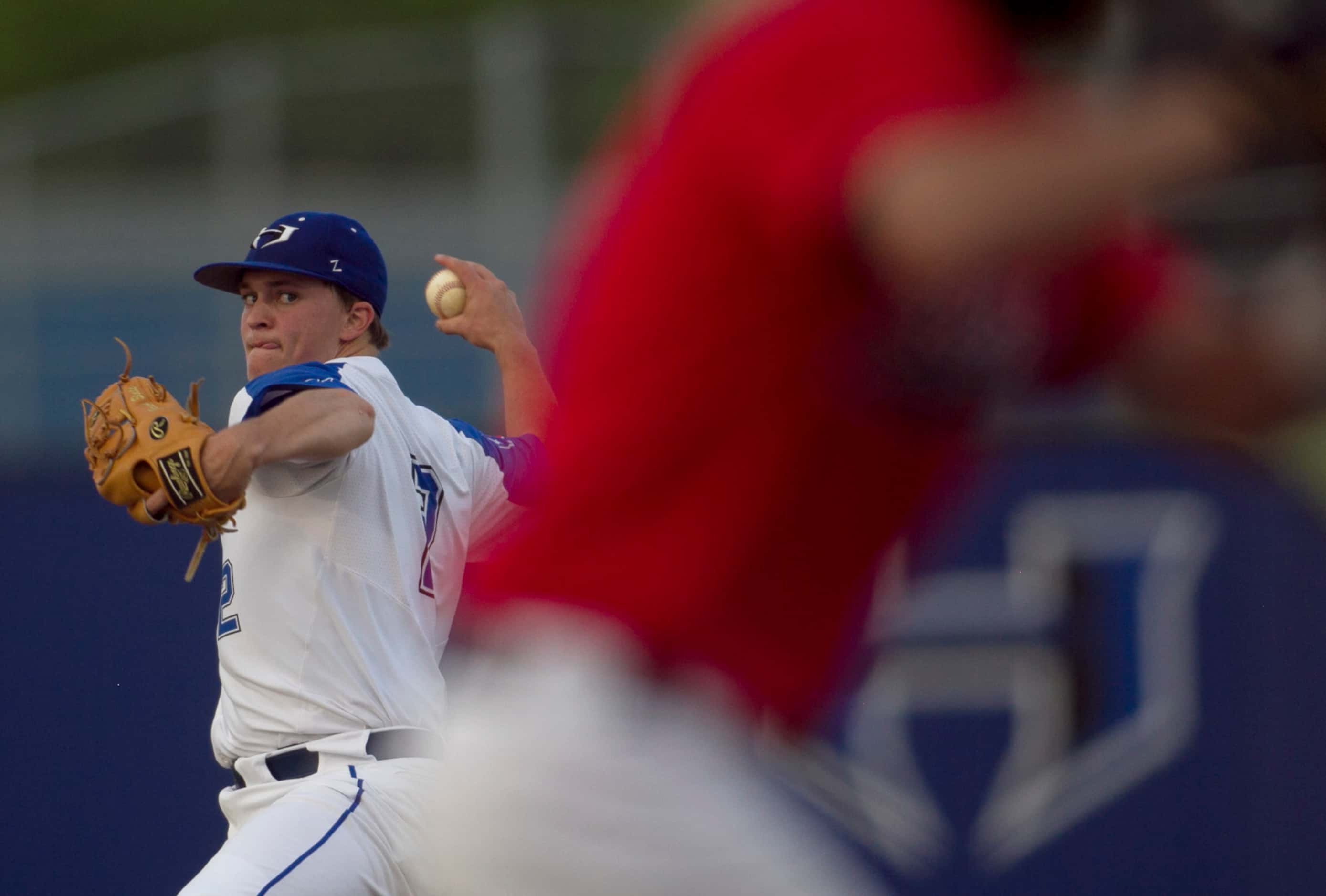 Hebron pitcher Jeremy Slate (2) delivers a pitch to a Coppell batter during the top of the...