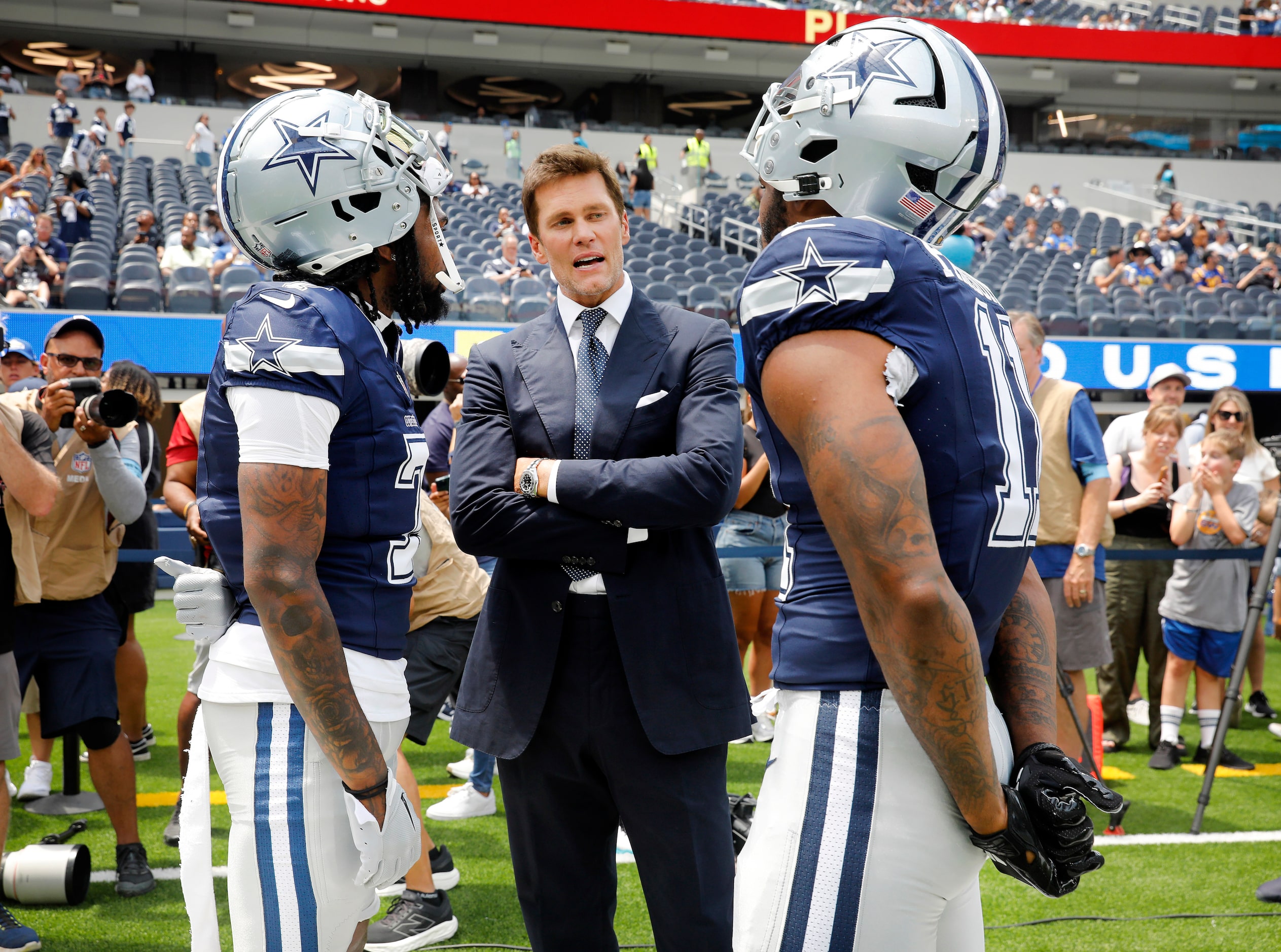 Dallas Cowboys linebacker Micah Parsons (right) and cornerback Trevon Diggs (left) visit...