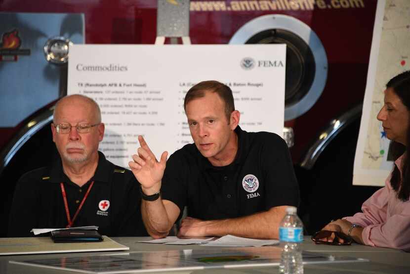 Administrator Brock Long of FEMA speaks during a firehouse briefing on Hurricane Harvey in...
