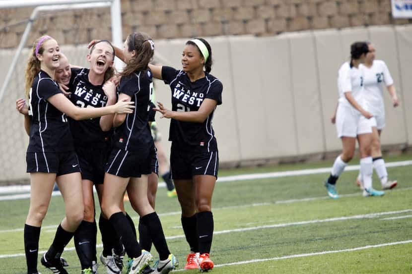 Plano West players celebrate after a goal by Abby Grace Cooper (5)  against the San Antonio...