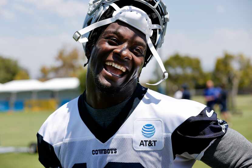 Dallas Cowboys wide receiver Michael Gallup (13) smiles when asked about what it felt like...