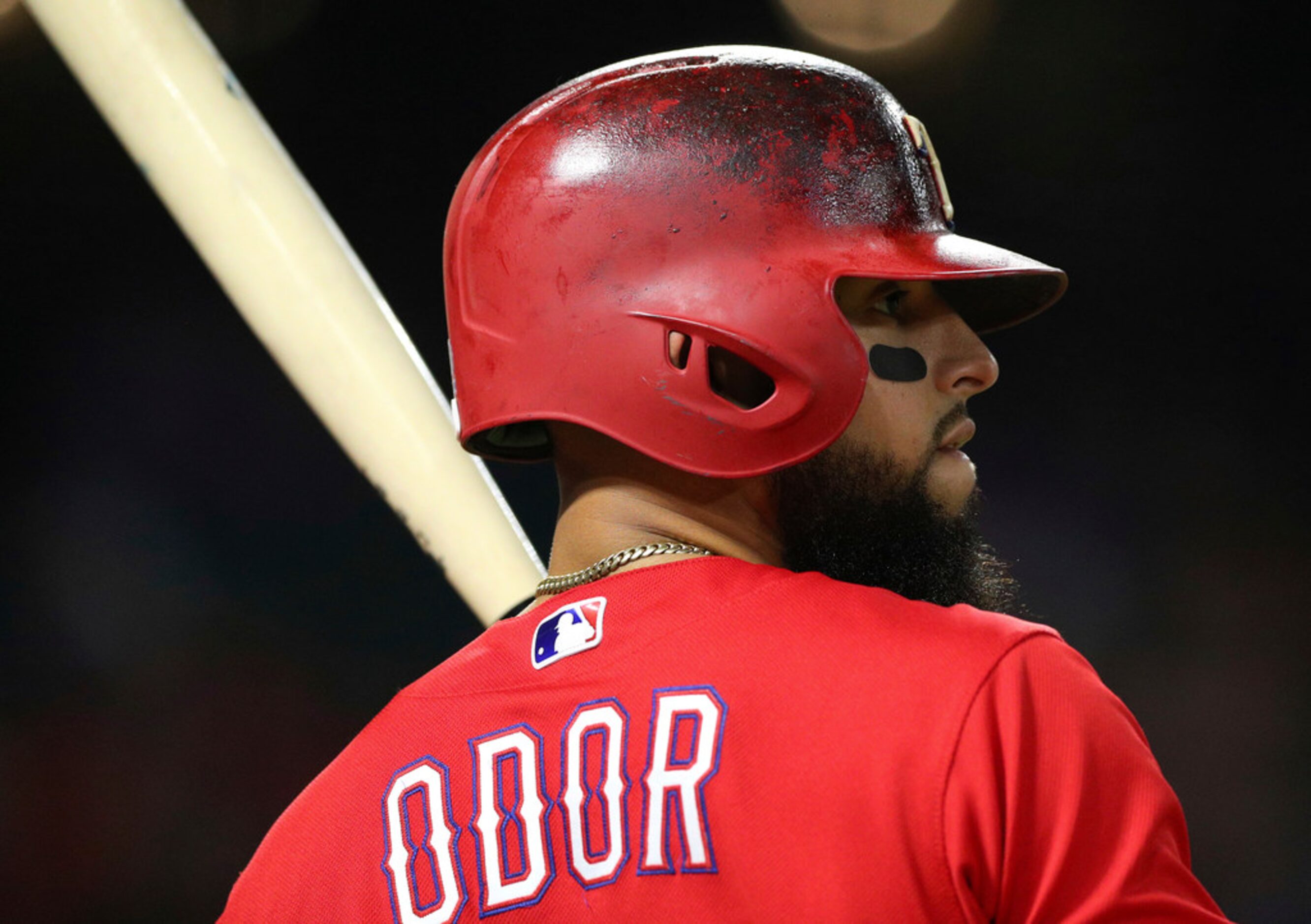 Texas Rangers' Rougned Odor (12) stands in he on deck circle in the bottom of the eight...