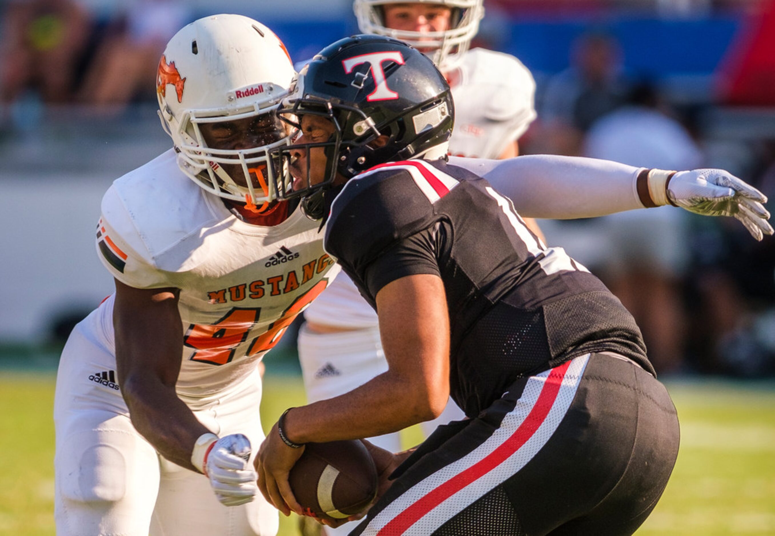 Sachse defensive lineman Anthony Anyanwu (46) sacks Euless Trinity quarterback Marcus Ervin...