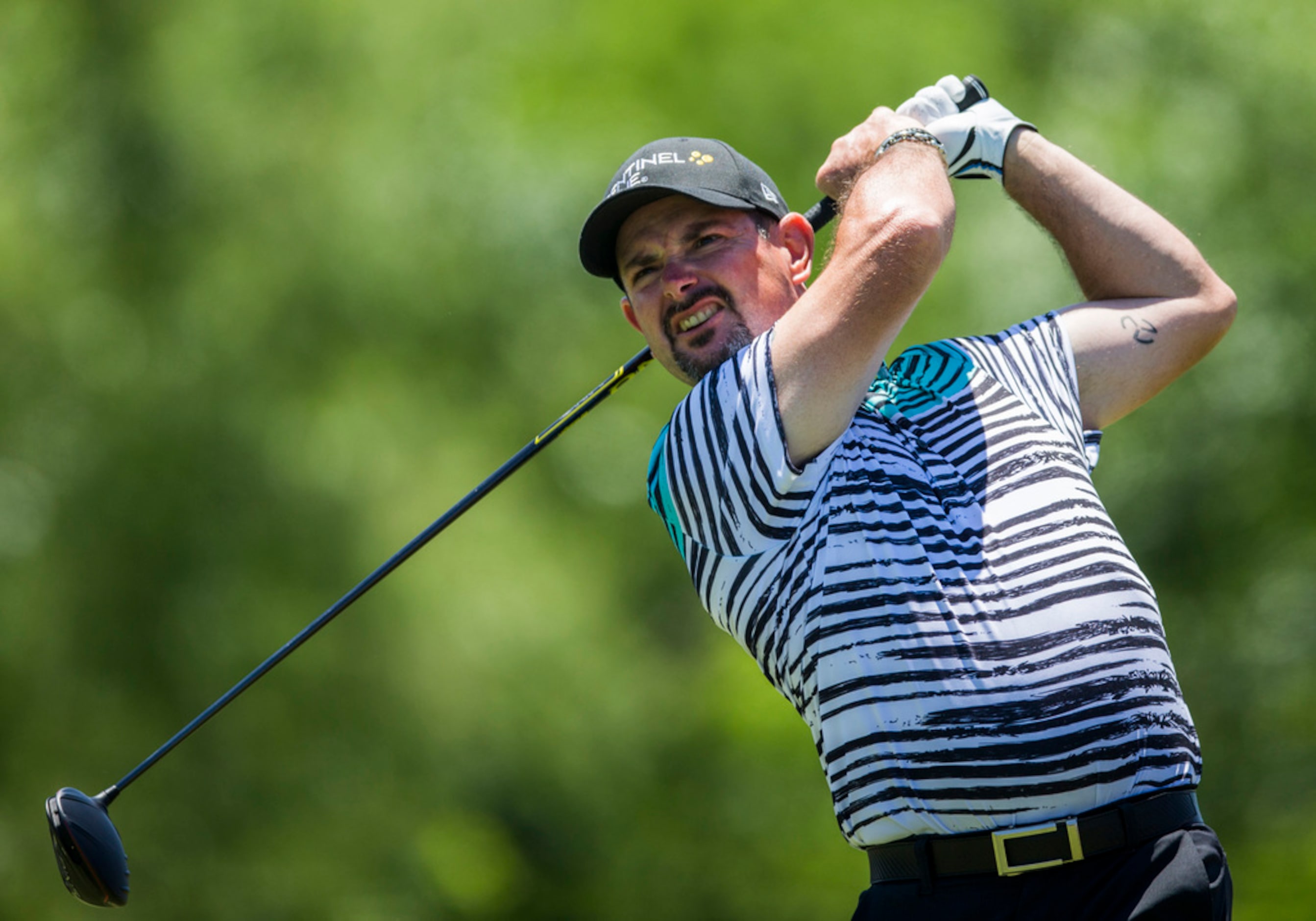 Rory Sabbatini tees off at hole 4 during round 4 of the AT&T Byron Nelson golf tournament on...