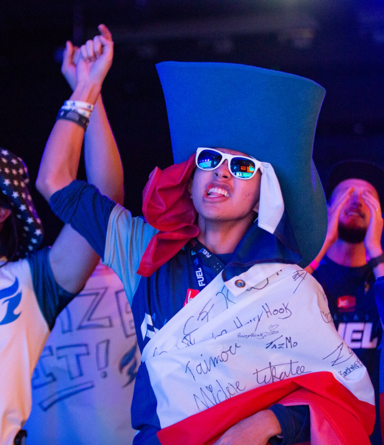 A fan celebrates the Dallas Fuel's third map lead during the season three opening weekend...