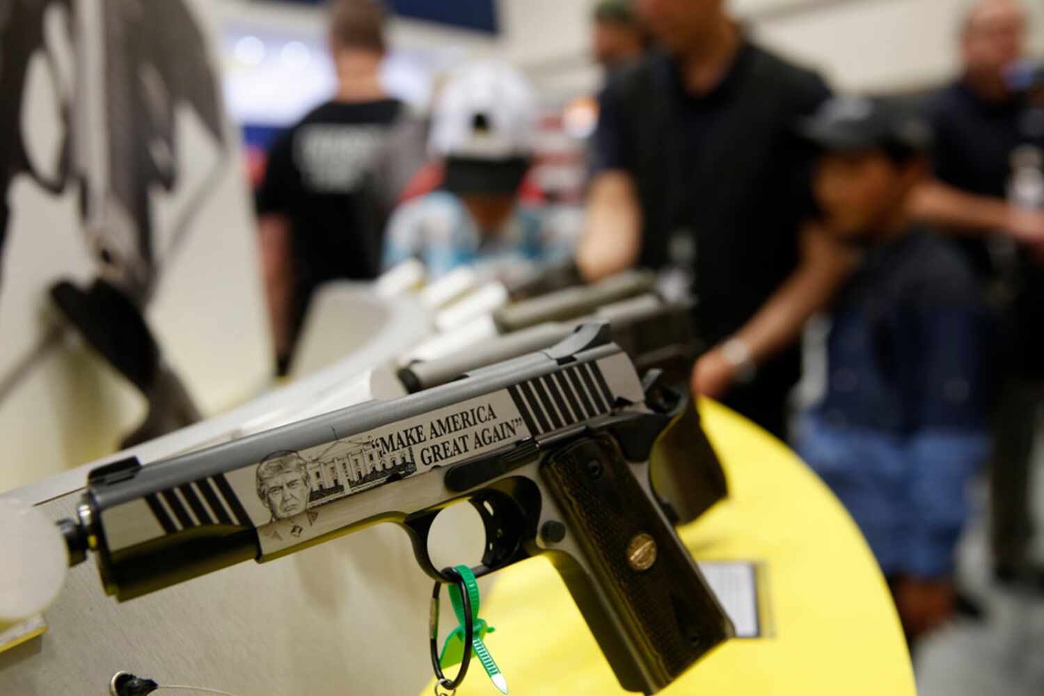 A Thompson Trump Custom 1911 on display at the NRA Annual Meeting & Exhibits at Kay Bailey...