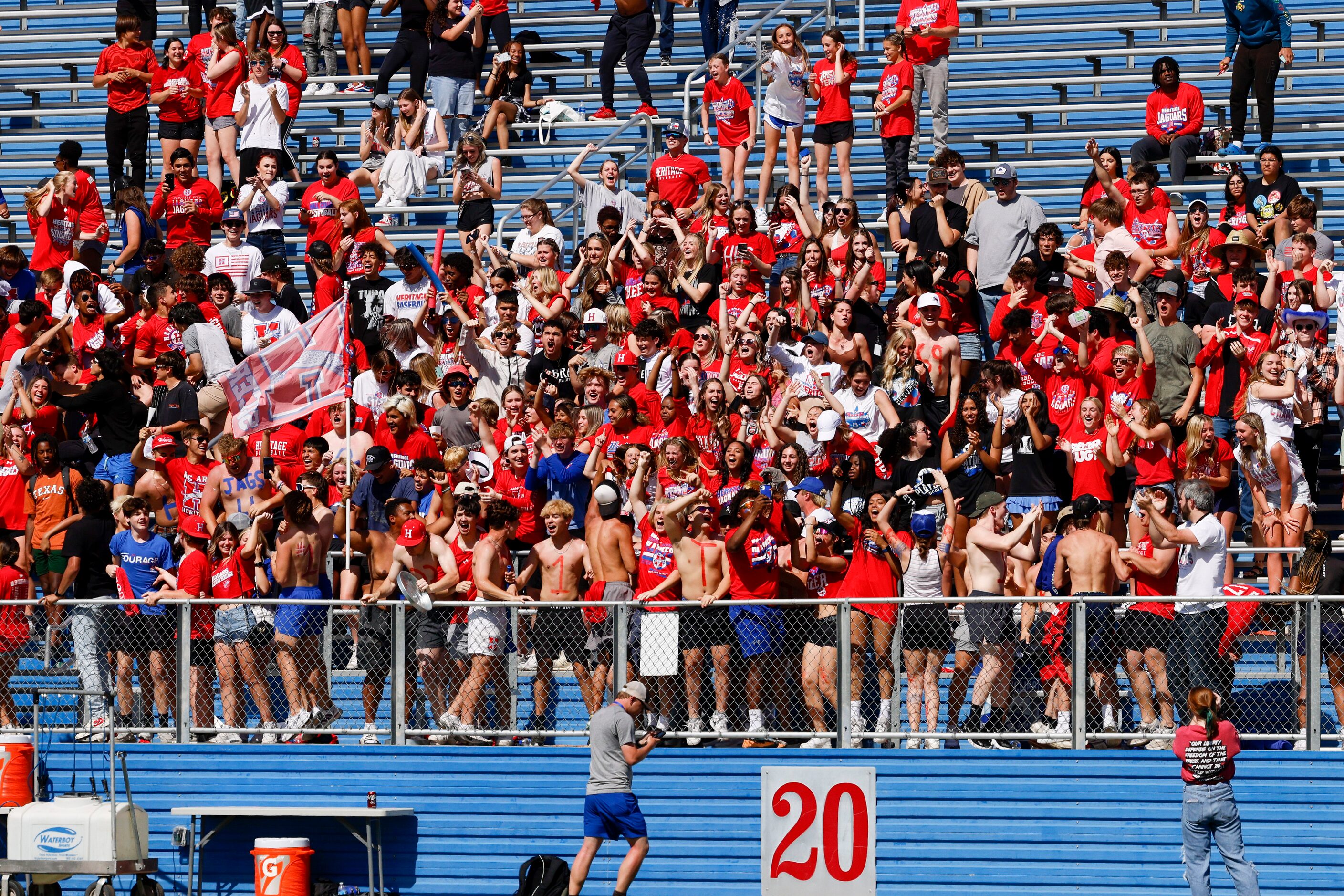 Midlothian Heritage fans celebrate after a goal during the second half of the Class 4A girls...